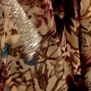 Velvet romper with partial see through fabric.